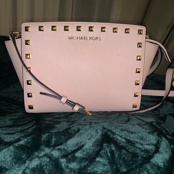 Michael Kors Handbags - Small Michael Kors pink studded crossbody bag
